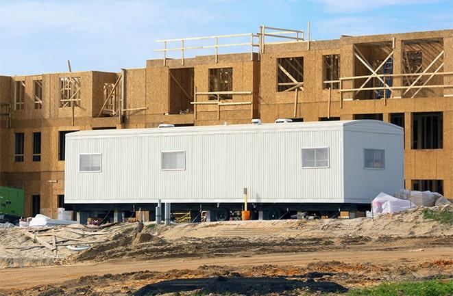 crane lifting modular building for construction office rentals in Dublin